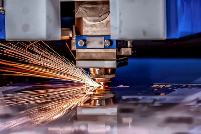 Photo of an industrial cutter, working on our laser cut flanges